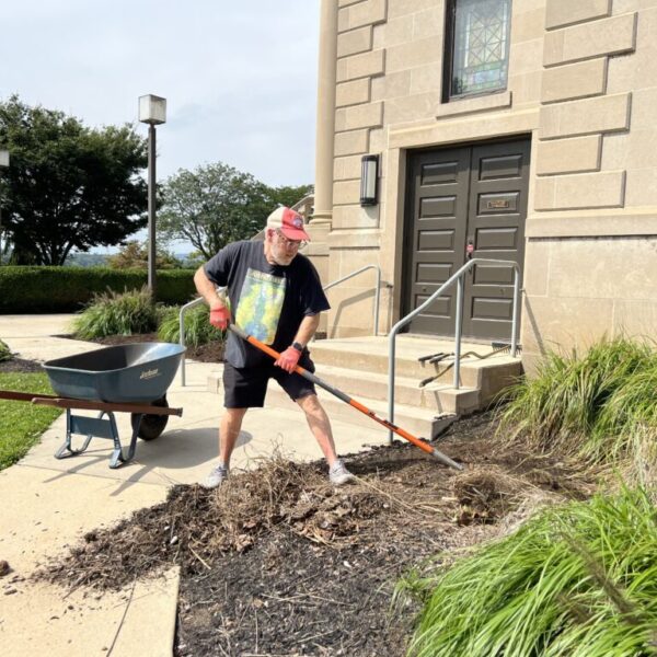 Rabbi Marc, cleaning up the Temple grounds.