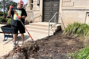 Rabbi Marc, cleaning up the Temple grounds.
