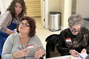 Sign-in Table Shelley Adler, Miriam Robinson & Frankie Glass